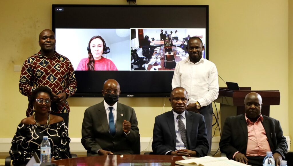 Some of the IGE Cohort 2021 Fellows pose for a group photo with Assoc. Prof. Eria Hisali (Seated 2nd R) and Prof. Edward Bbaale (Seated 2nd L) during the workshop.