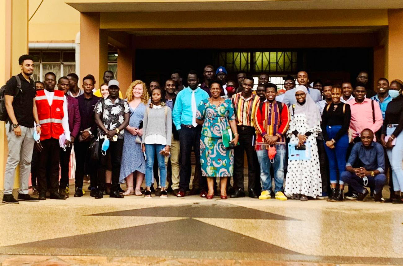 The Head International Office, Ms. Martha Muwanguzi (C) with International Students and Association Heads after the orientation on 25th February 2022, Senate Building, Makerere University.