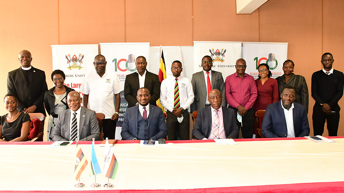 Front Row: The Vice Chancellor-Prof. Barnabas Nawangwe (2nd L) with L-R: Dean of Students-Mrs. Winifred Kabumbuli, Students Disciplinary Committee Chairperson-Mr. Isaac Newton Kyagaba, Ag. DVCFA-Prof. Henry Alinaitwe, US-Mr. Yusuf Kiranda and Standing L-R: Rev. Can. Onesimus Asiimwe, Dr. Sylvia Nannyonga-Tamusuza, Dr. Godfrey Akileng, Commissioner of Oaths-Hajji Farouk Kamulegeya, Vice Guild President- H.E. Nelson Ssewanyana, Mr. Gonzaga Mbalangu, Mr. Agaba Issa Mugabo, Ms. Naome Kiconco, Ms. Phiona Natukunda and Mr. Bbosa Henry Price after the swearing-in ceremony on 18th March 2022, Council Room, CTF1, Makerere University.