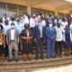 University Bursar-Mr. Evarist Bainomugisha (Front 4th Left), Head Grants Administration and Management Support Unit-Prof. Grace Bantebya (Front 5th Left), University Secretary-Mr. Yusuf Kiranda (Front 6th Left) join other participants in a group photo at the opening of a four-day workshop on Project Financial Management, 23rd March 2022, SFTNB Conference Hall, Makerere University.