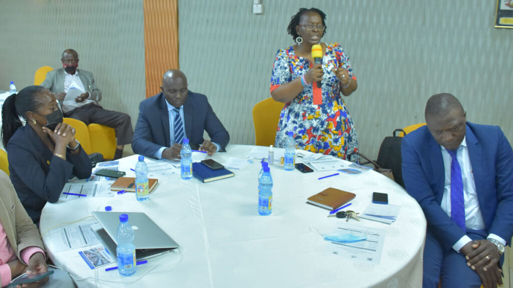 Head GAMSU-Prof. Grace Bantebya Kyomuhendo (standing) makes her submission as L-R: Deann of Students-Mrs. Winifred Kabumbuli, Academic Registrar-Mr. Alfred Masikye Namoah, Director Legal Affairs-Mr. Javason Kamugisha and Deputy Principal CHS-Prof. Isaac Kajja (Right) listen keenly. 