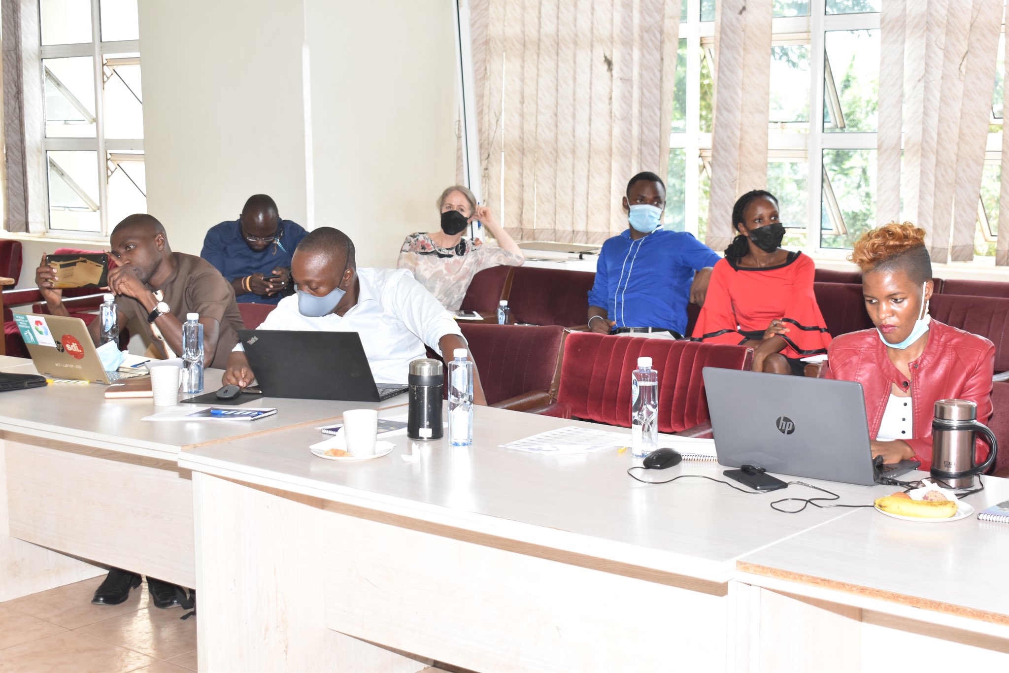 Participants in the International Symposium on Covid-19 Effects and Responses in Informal Settlements and Commercial Zones of Kampala, held 15th March 2022 in the CoCIS Conference Hall, Makerere University.