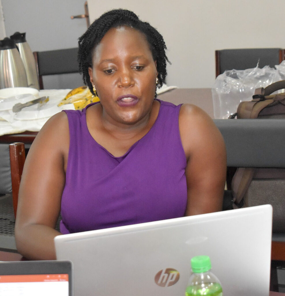 Dr. Behabura Generous Betunga presents her research progress report.