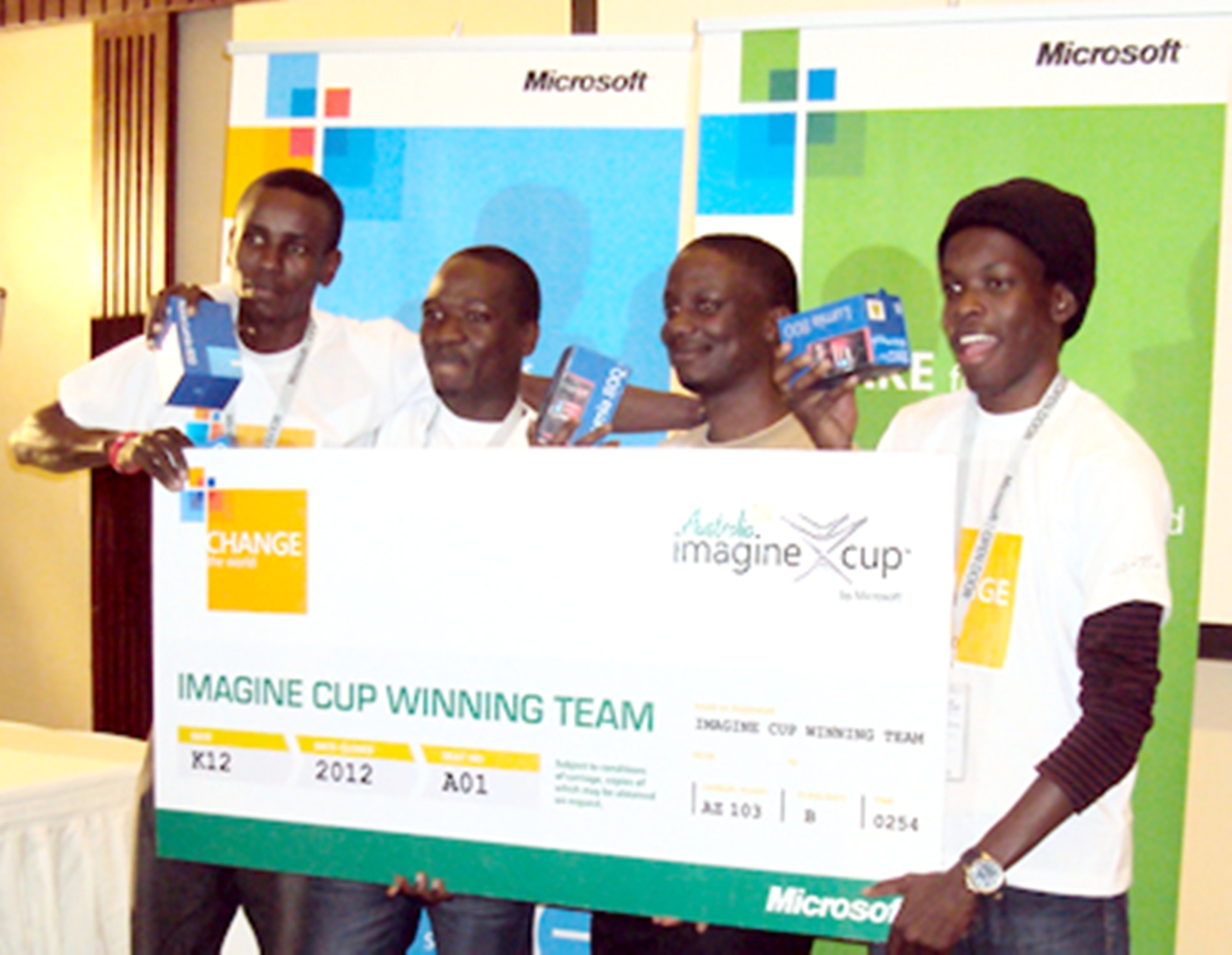The Cipher 256 Team L-R: Joshua Okello, Josiah Kavuma, Joseph Kaizzi (their mentor) and Aaron Tushabe after winning the Microsoft Imagine Cup competition with their WinSenga Mobile App.