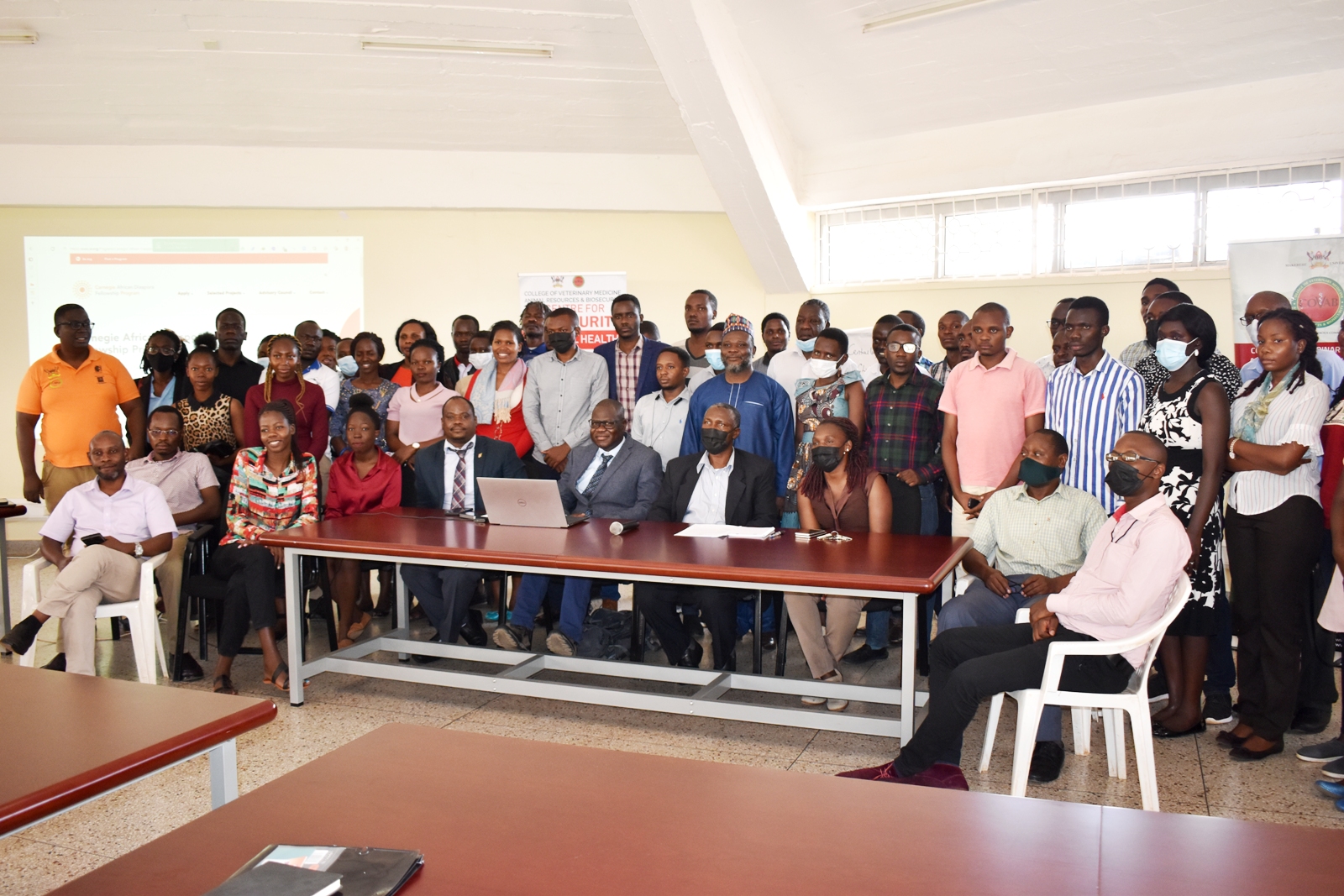 Facilitators and participants in the training on Research Methods, Experimental Design and Data Analysis take off time for a group photo on 1st April 2022, CoVAB, Makerere University.