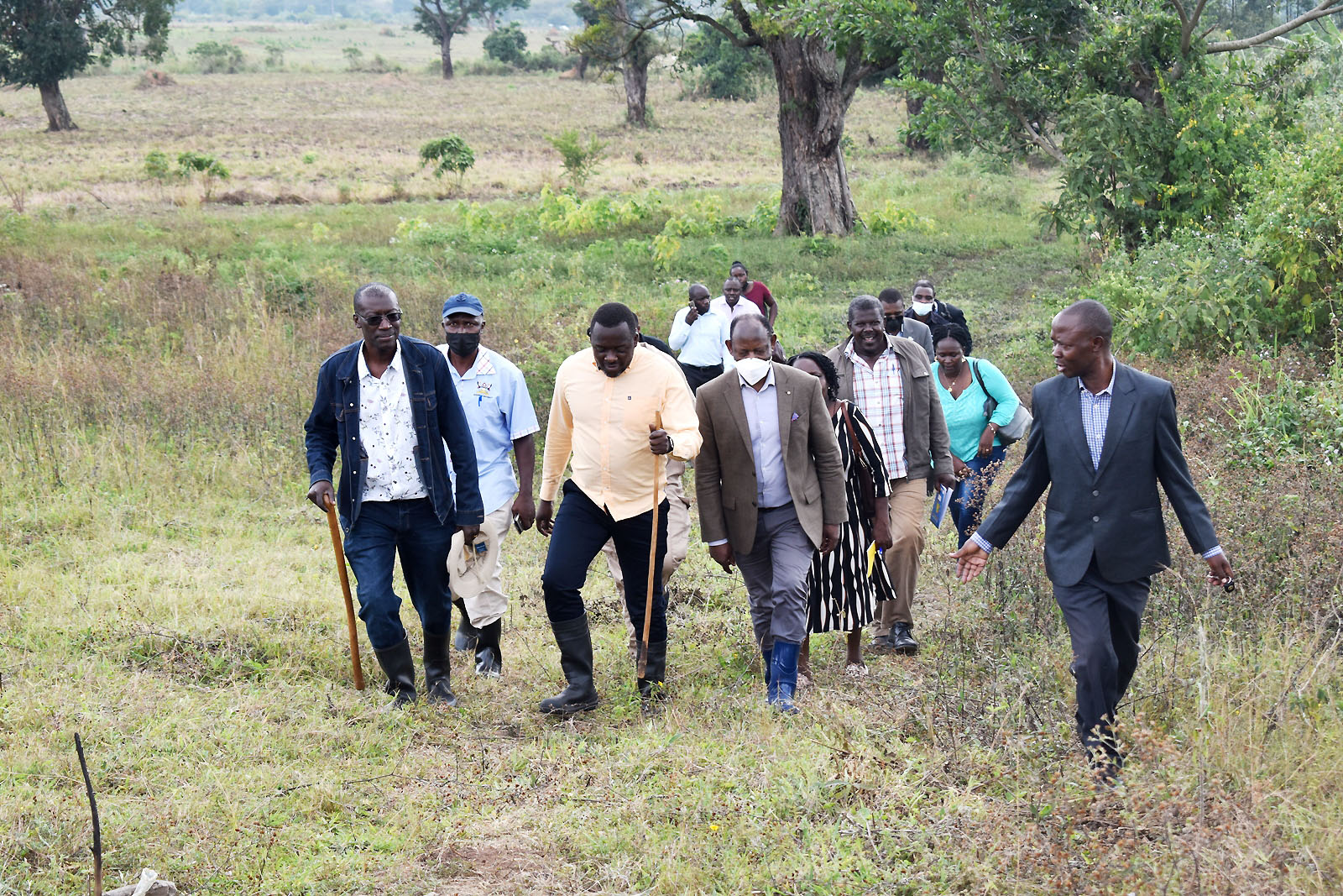The Farm Manager, Dr. Wasswa Mathias (R) takes the Vice Chancellor-Prof. Barnabas Nawangwe (2nd R), University Secretary-Mr. Yusuf Kiranda (3rd R), Principal CoVAB-Prof. Frank Mwiine (L) and other officials on a guided tour of Buyana Stock Farm on 7th April 2022.