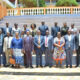 The Vice Chancellor, Prof. Barnabas Nawangwe (Front Row Centre) flanked by the DVCAA-Associate Prof. Umar Kakumba (on his left), Ag. DVCFA- Prof. Henry Alinaitwe (4th Right), Head of Mak-RIF-Prof Fred Masagazi Masaazi (6th Right) and Head GAMSU-Prof. Grace Bantebya Kyomuhendo (5th Right) join other management officials in a group photo after a meeting held at Hotel Africana, Kampala on 4th April 2022..