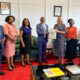 H.E. Dr. Karin Boven, Ambassador of the Netherlands to Uganda (3rd R) receives an assortment of Mak souvenirs from the Vice Chancellor, Prof. Barnabas Nawangwe (C) as the Dean MakSPH, Prof. Rhoda Wanyenze (2nd L) and other officials witness on 13th April 2022, CTF1, Makerere University.