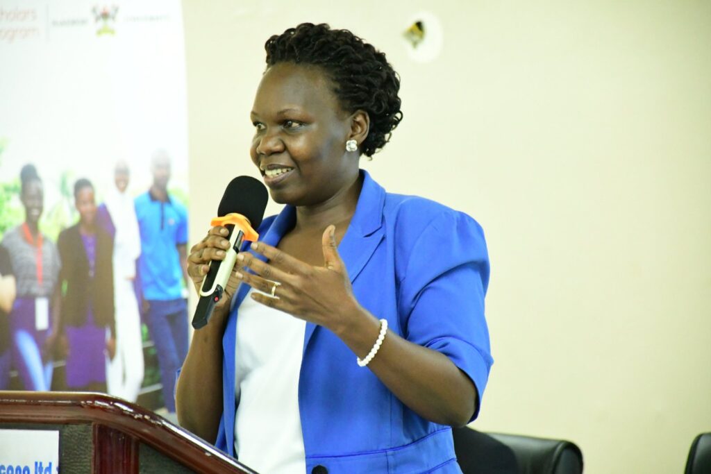Mrs. Susan Opok Tumusiime, the Executive Director, Forum for African Women Educationalists (FAWE) Uganda chapter delivers the Keynote Address at the MCFSP Mentors' Symposium. 