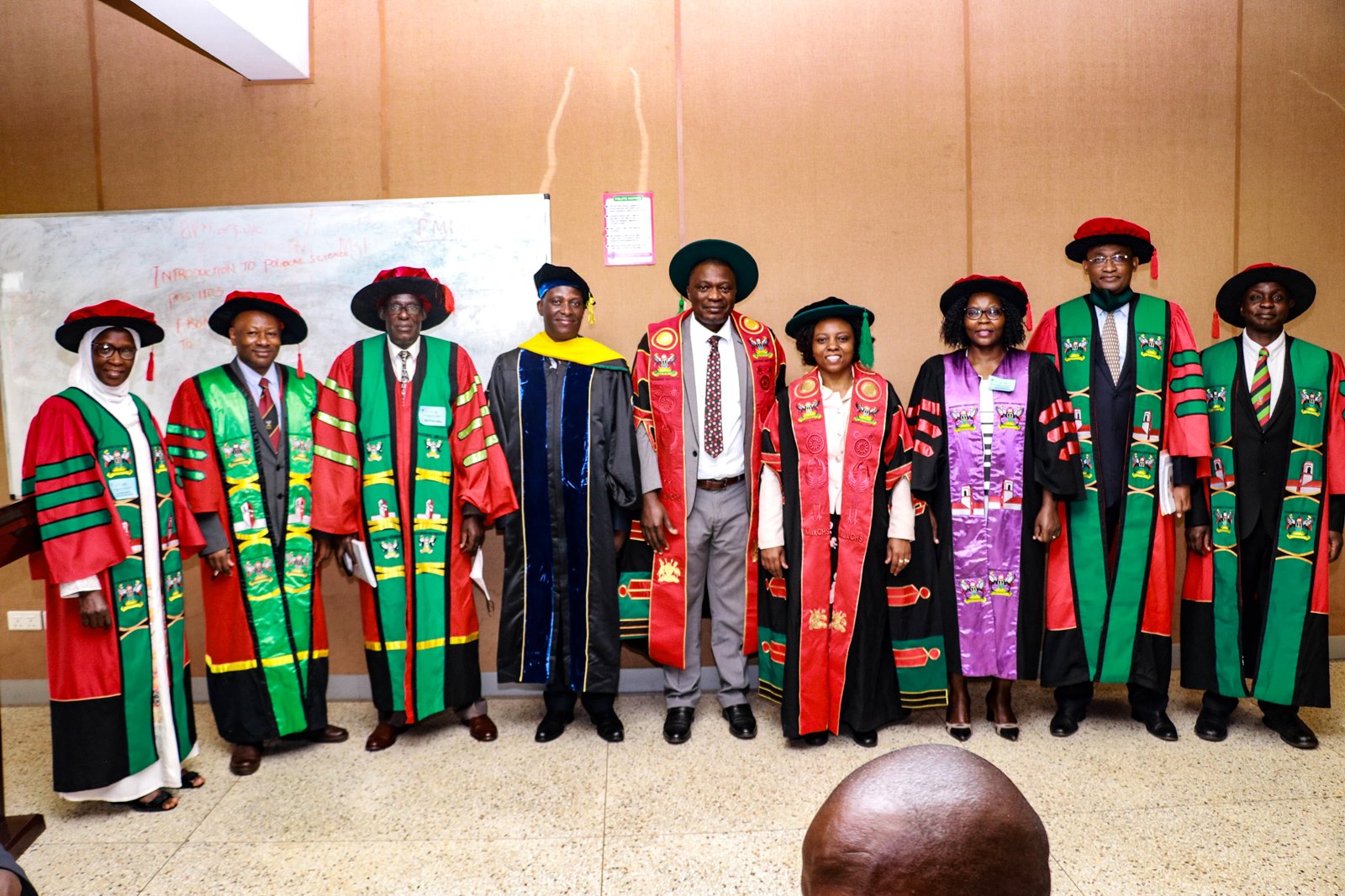 The College of Health Sciences (CHS) Leadership in a group photo before the First Session of Makerere University's 72nd Graduation Ceremony. Photo by Davidson Ndyabahika