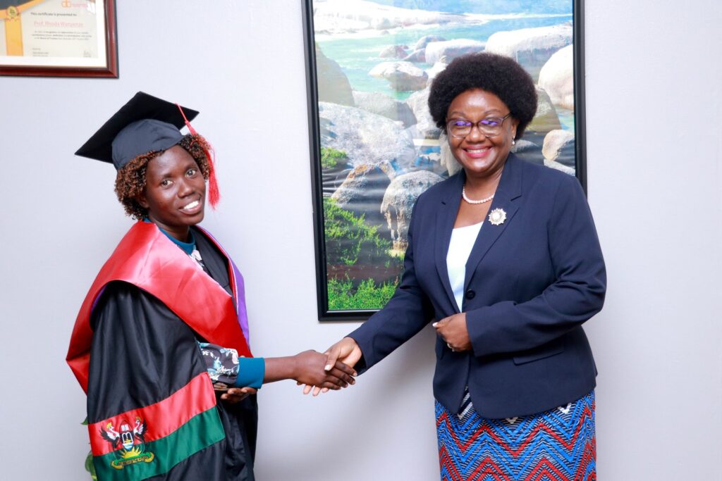Dr. Rhoda Wanyenze, MBChB, MPH, PhD, is a Professor and Dean of Makerere University School of Public Health (MakSPH) congratulates Ms. Audo Tabitha (Left).