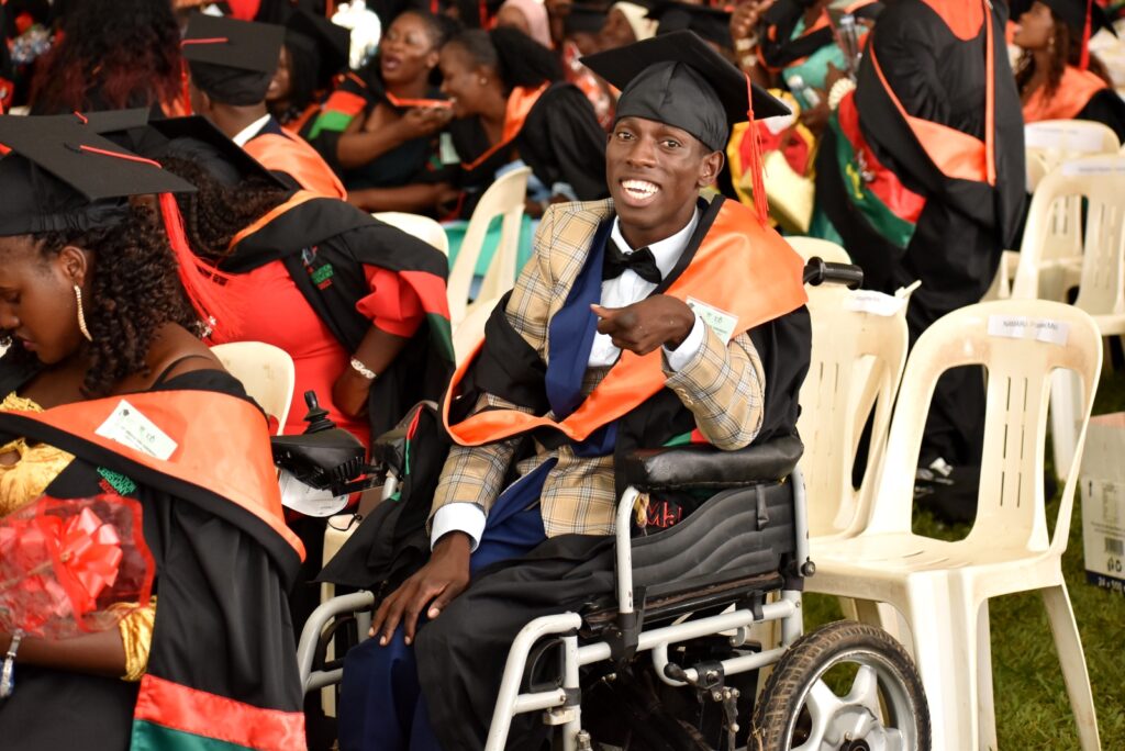 A euphoric male Graduand from CEES at the Second Session of the 72nd Graduation Ceremony. 