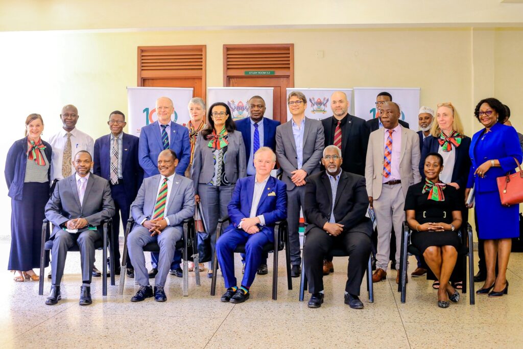 Seated: The Vice Chancellor-Prof. Barnabas Nawangwe (2nd L) and President of KI-Prof. Ole Petter Ottersen (C) with L-R: DVCAA-Prof. Umar Kakumba, Rector Benadir University-Prof. Mohamed Mohamud Bidey, Dean of Students-Mrs. Winifred Kabumbuli, Members of Management and the delegation from KI on 5th May 2022, CTF1, Makerere University.