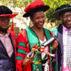 Dr. Caroline Adoch (C) flanked by the Principal, LAW-Prof. Christopher Mbazira (L) and his Deputy Dr. Ronald Naluwairo (R) at the First Session of Makerere University's 72nd Graduation Ceremony on 23rd May 2022.