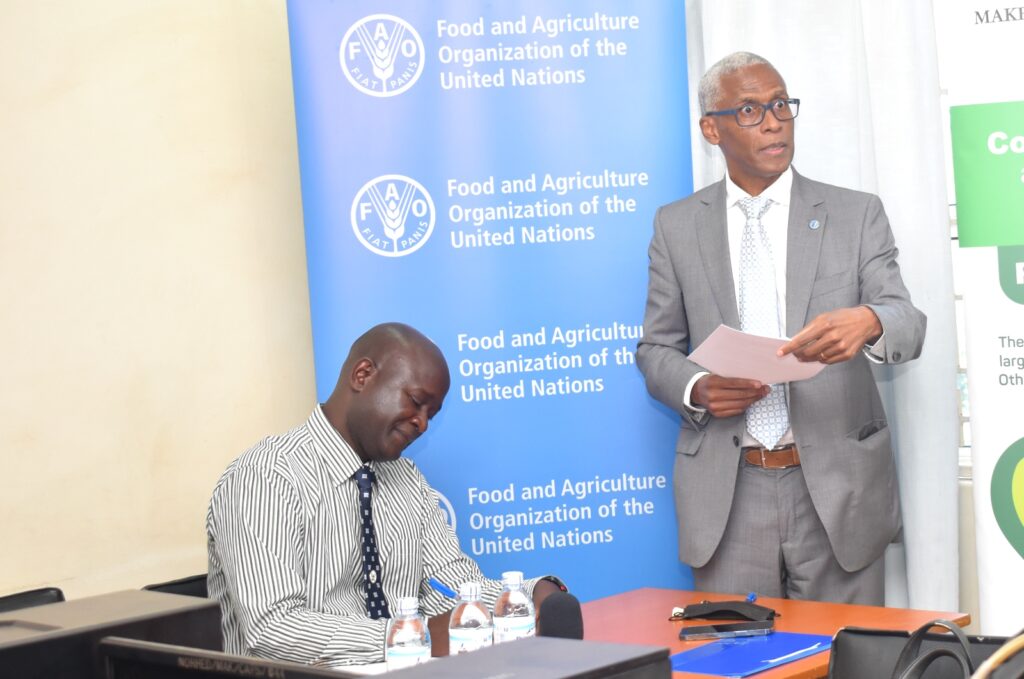 Dr. Querido Antonio, the Food and Agriculture Organisation (FAO) Country Representative for Uganda (R) delivering his remarks.