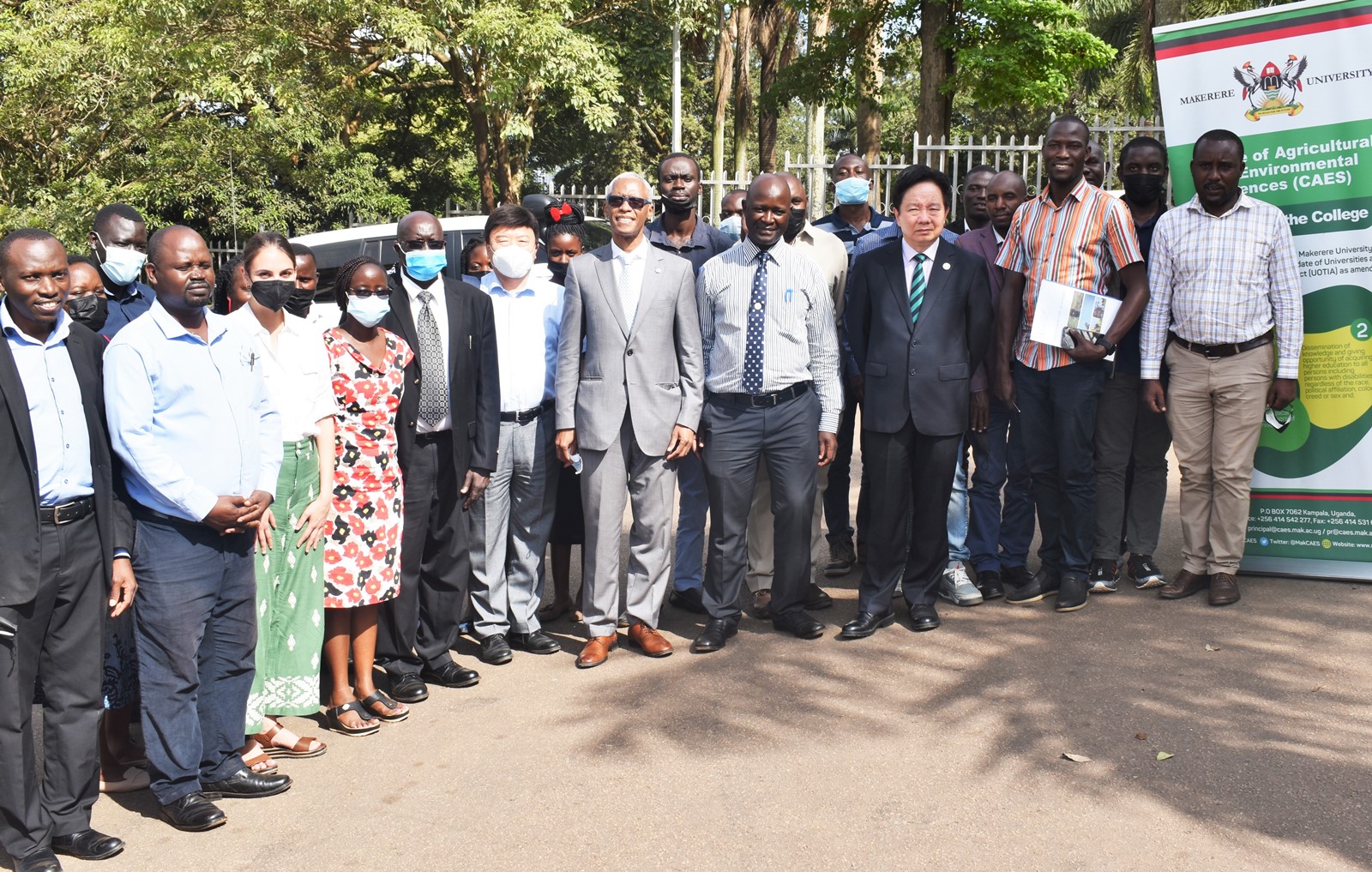 The Director, Office of South-South and Triangular Cooperation Division, FAO-Mr Anping Ye (3rd R), FAO Country Representative-Dr. Querido Antonio (5th R), Ag. Principal CAES-Prof. Yazidhi Bamutaze (4th R) and participants after the opening ceremony on 13th June 2022, CoCIS, Makerere University.