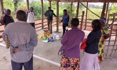 AFRISA’s Programme Officer and Principal Instructor of Dairy Industry and Business, Mr. Israel Baguma takes livestock farmers through training on livestock health promotion and drugs at the newly constructed dairy value chain end user facility on 9th June, 2022 at Kaberekeke, Butebo District.