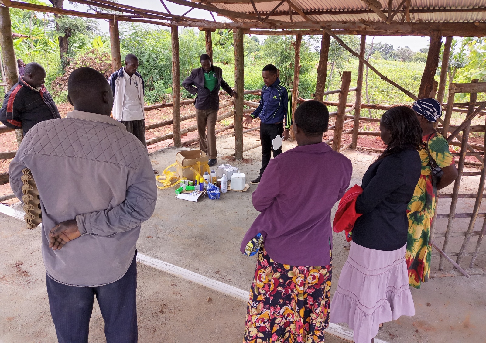 AFRISA’s Programme Officer and Principal Instructor of Dairy Industry and Business, Mr. Israel Baguma takes livestock farmers through training on livestock health promotion and drugs at the newly constructed dairy value chain end user facility on 9th June, 2022 at Kaberekeke, Butebo District.