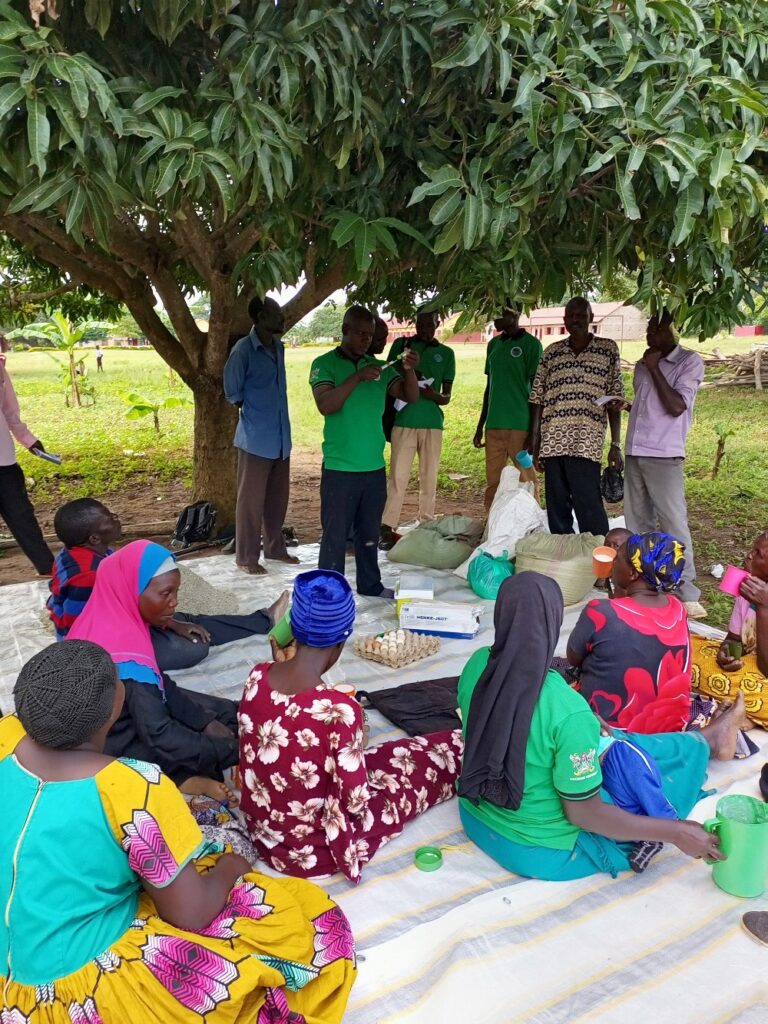 Participants in a practical on poultry drugs and vaccination.