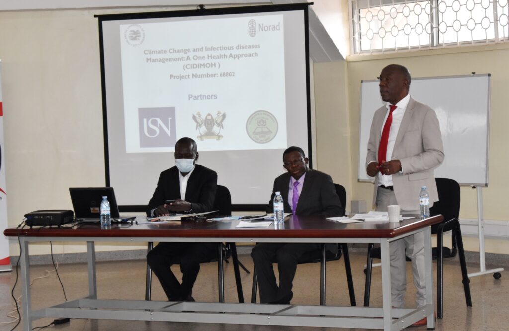 The Deputy Vice Chancellor Finance and Administration Prof. Henry Alinaitwe (R) addresses stakeholders at the event.