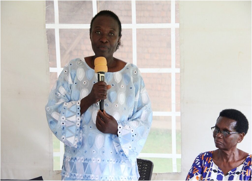 Ms. Frances Nyachwo (L) flanked by Ms Evelyn Nyakoojo (R) addresses the audience