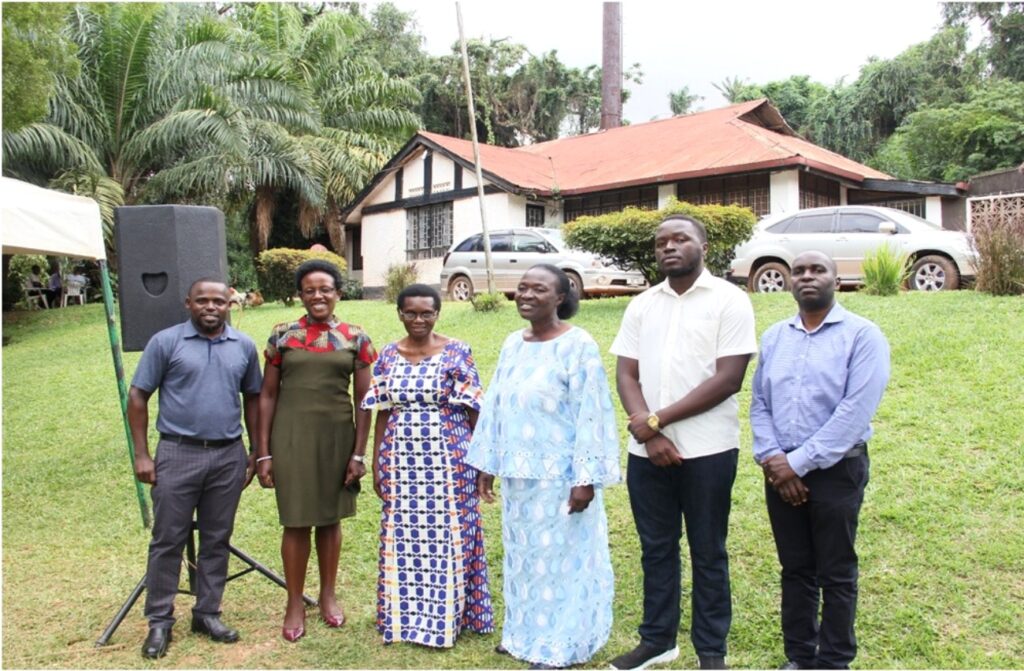 Ms. Frances Nyachwo (Third from Right) with Ms Evelyn Nyakoojo (Third from Left), colleagues from GMD and members of her family