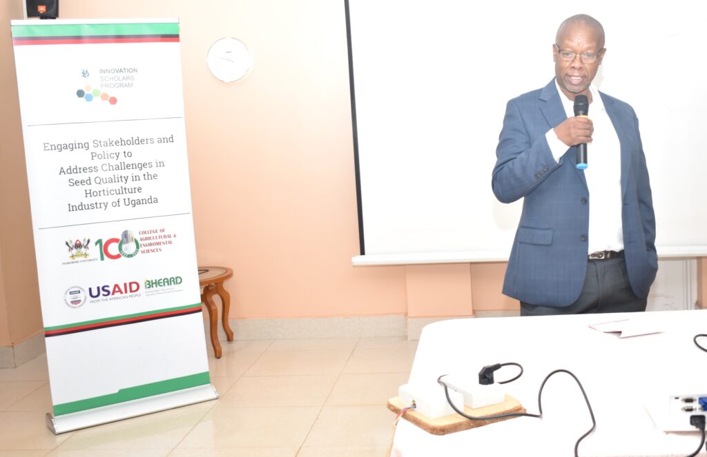  Dr. Fredrick Bagamba delivering his remarks. He briefed participants on the mandate of the CAES Innovation Scholars Program.