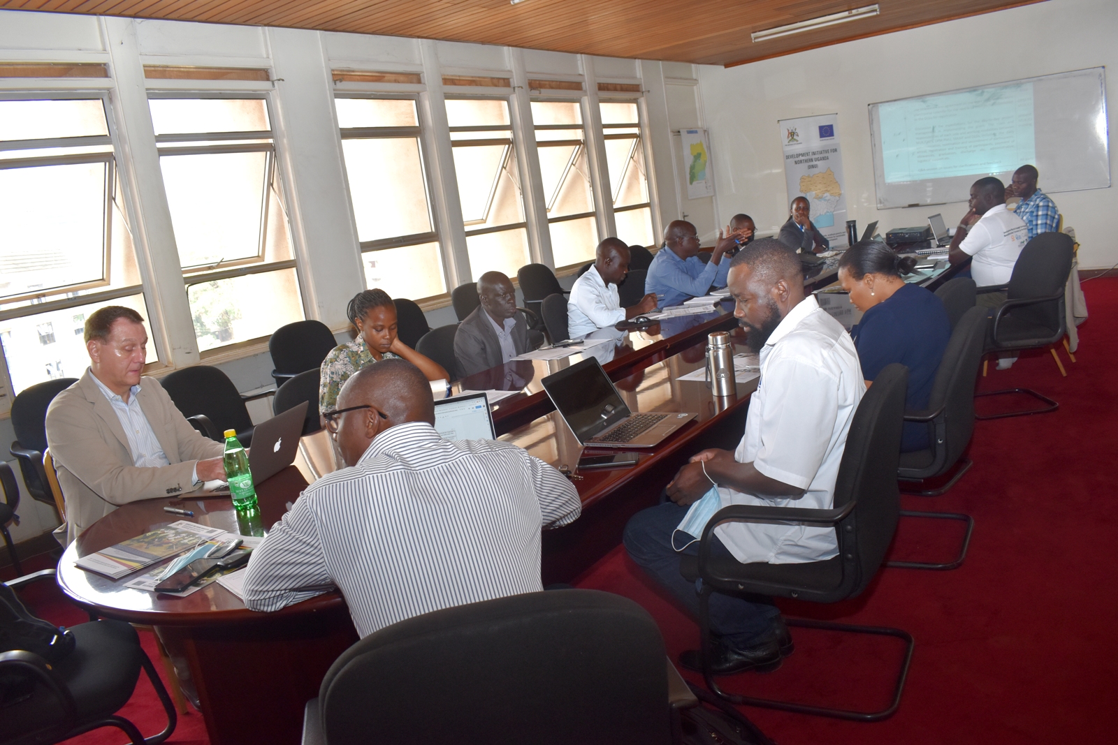 The CAES team led by Dr Bernard Obaa in a meeting with staff from the Office of the Prime Minister on 27th July 2022, Kampala.