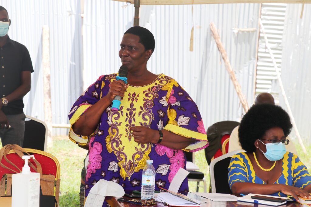 Hon. Hellen Asamo, Minister of State for Disability Affairs chairing a PDM sensitization and mobilization District meeting in Budaka on Friday, 24th June, 2022.