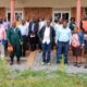The Principal CoVAB, Prof. Nobert Frank Mwiine (4th R) with college staff at Nakyesasa during the visit on 25th July 2022.
