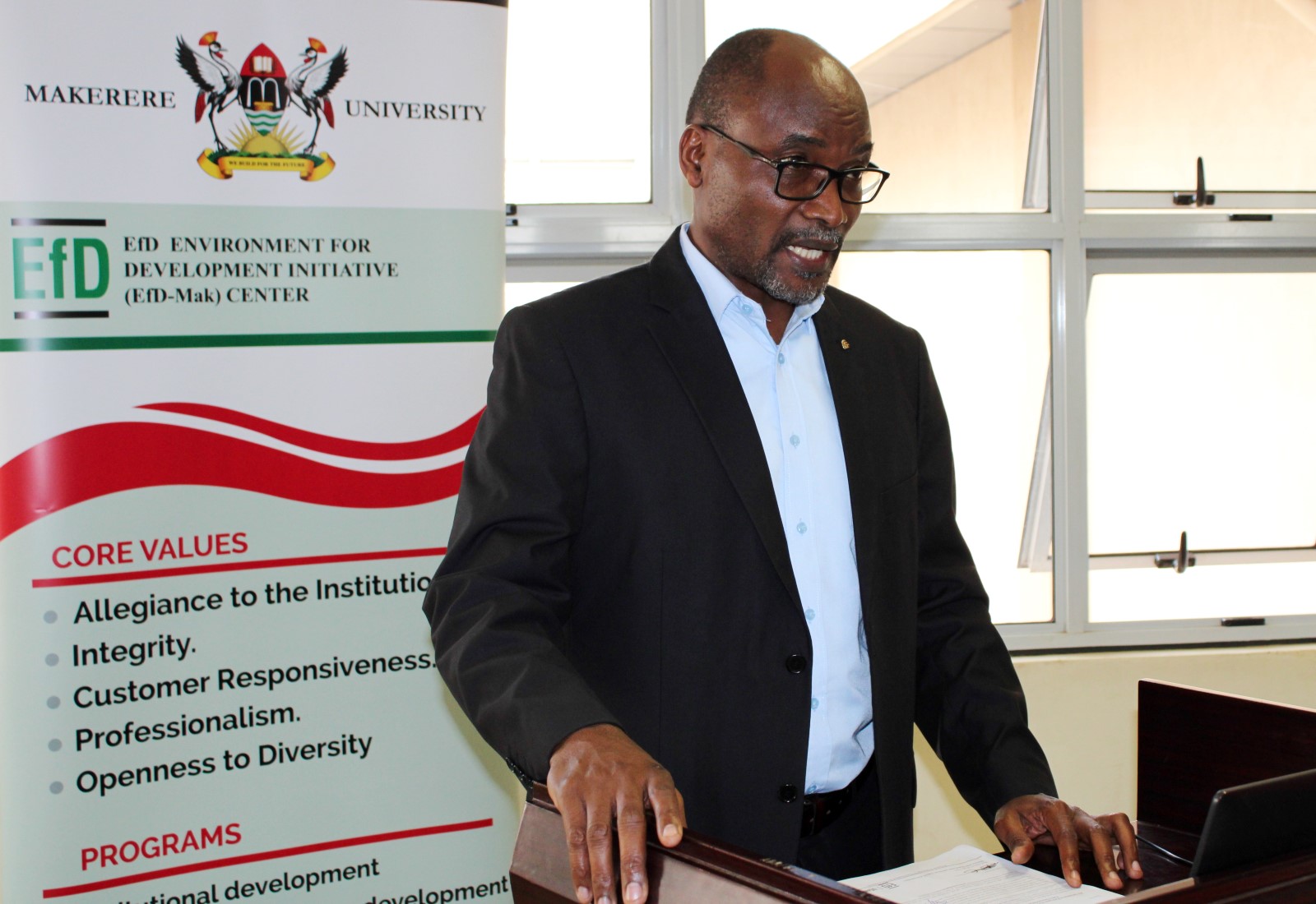 Dr. Yawe Bruno the Deputy Principal, College of Business and Management Sciences (CoBAMS) officially opening the workshop on 15th July 2022 at Makerere University.