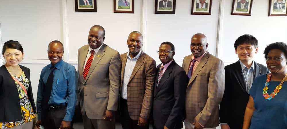 L-R: Ms. Mai Toda Nakano, Prof. Stephen Kimani, Ag. DVCFA-Prof. Tonny Oyana, Head of the JKUAT-JICA delegation-Prof. Robert Kinyua, Prof. Mukadasi Buyinza, Prof. Daniel Sila, Associate Professor Shohei Aoki and Ms. Martha Muwanguzi pose for a photo in the DVCFA’s Office during the visit on 5th July 2022 in the Frank Kalimuzo Central Teaching Facility, Makerere University.