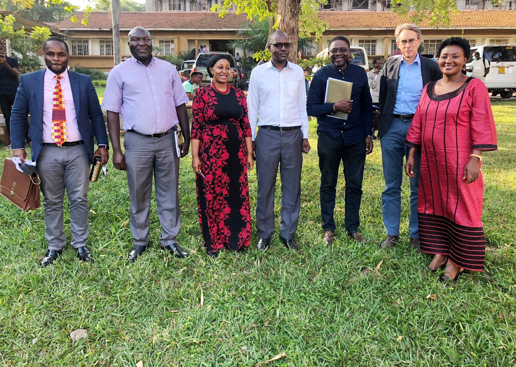 The Principal SoL-Prof. Christopher Mbazira (C), Deputy Principal SoL-Assoc. Prof. Ronald Naluwairo (2nd L), Director HURIPEC-Dr. Zahara Nampewo (3rd L) with R-L: Hon. Winnie Kiiza, Executive Director HRW-Mr. Kenneth Roth, Prof. Joe Oloka-Onyango and the Keynote Speaker-Dr. Busingye Kabumba after the Symposium on 30th June 2022 at Makerere University.