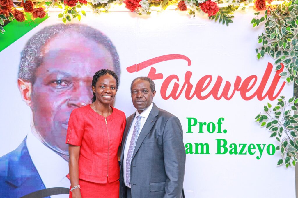 Associate Prof. Esther Buregyeya, the Head of Disease Control and Environmental Health Department in a photo moment with Prof. Bazeyo. 