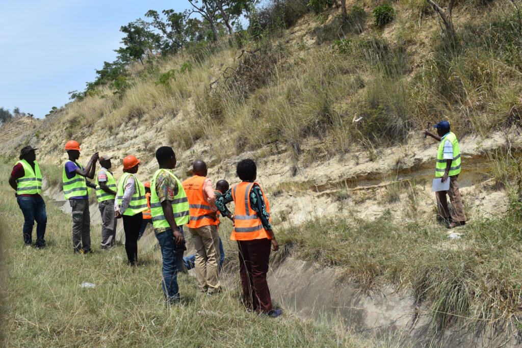 The project team assessing study sites for geology students in the Semliki Basin.