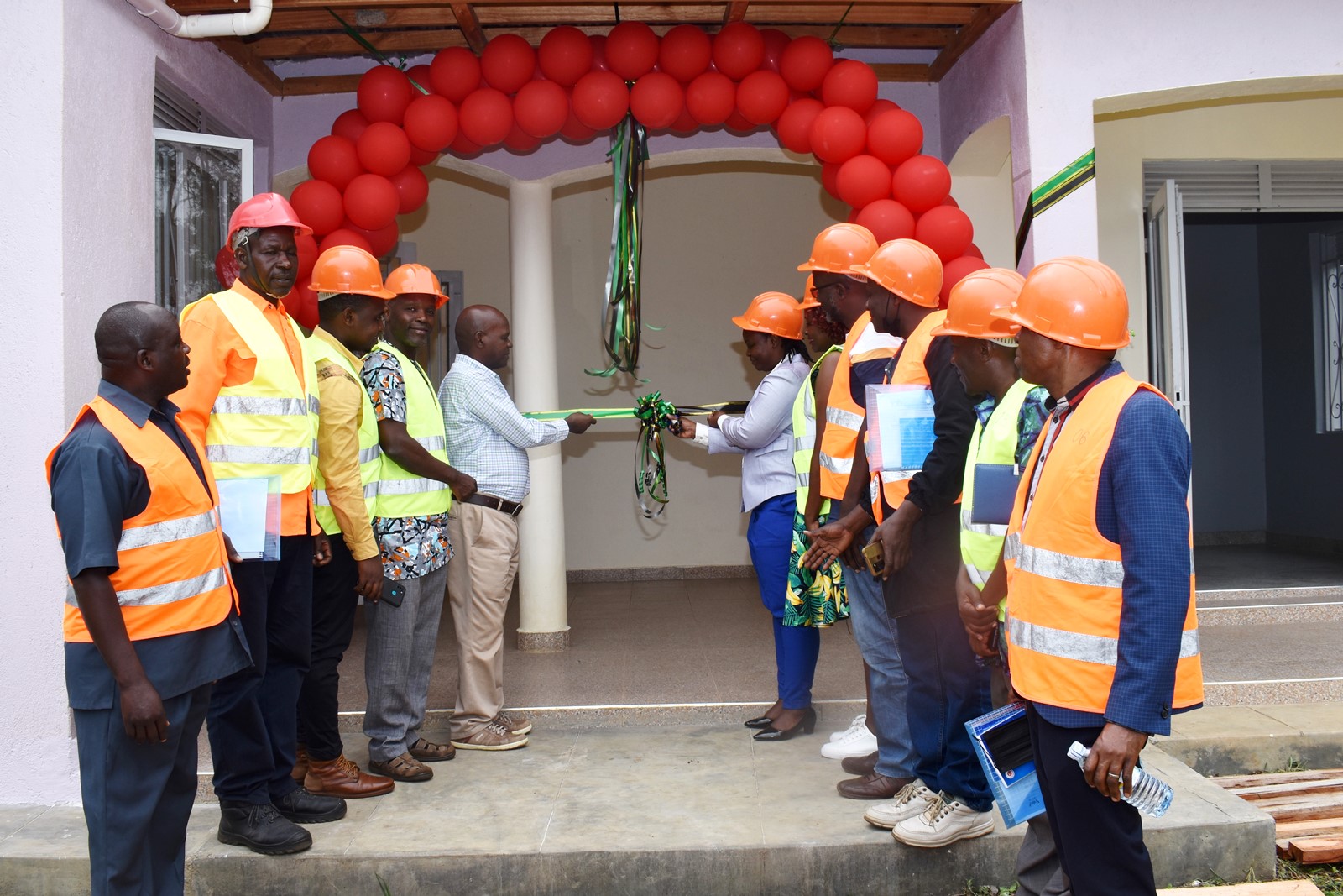 The the Warden Research and Ecological Monitoring, Kibale Conservation area, Ms. Dorothy Kirumira together with the project team commissioning the station on 6th August 2022 in Kibale.