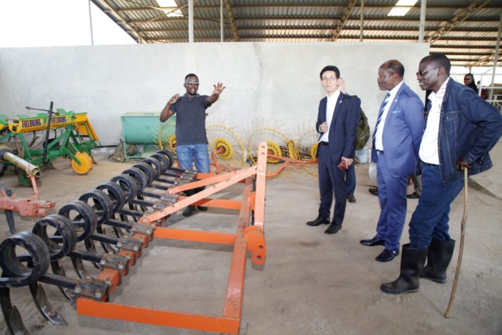 Ambassador Park, Prof. Nawangwe and Prof. Mwiine inspect some of the implements during a tour of the facility.