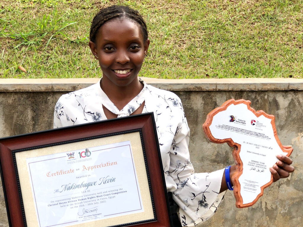 Ms. Kevin Nakimbugwe shows off her accolades.
