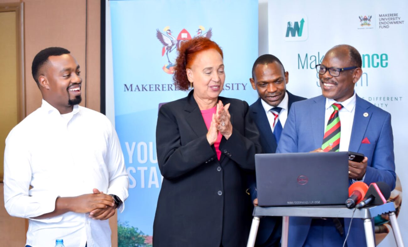 The Vice Chancellor-Prof. Barnabas Nawangwe (R) launches the #MakAdvance System as the DVCAA-Prof. Umar Kakumba (2nd R), MakEF Board Chairperson-Prof. Margaret J. Kigozi (2nd L) and System Development Team Lead-Joshua Muhumuza (L) witness on 2nd August 2022, Frank Kalimuzo Central Teaching Facility, Makerere University.