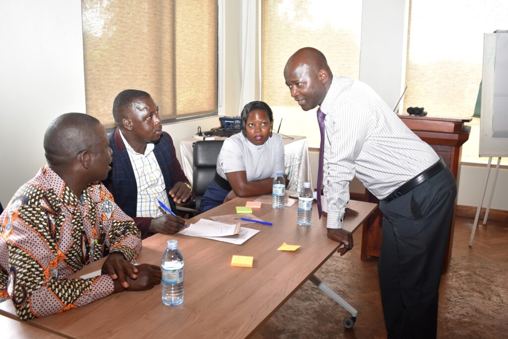 Participants in group discussions about the causes of wetland degradation and the Causal Loop Diagram methodology.