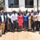 Participants in a group photo with the project team and the Deputy Principal of CAES, Prof. Yazhidi Bamutaze (5th L) on 24th August 2022, Kampala Uganda.