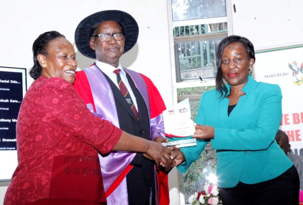 The Principal of CAES presents an award to Prof. Sabiiti in recognition of his distinguished service to Makerere.