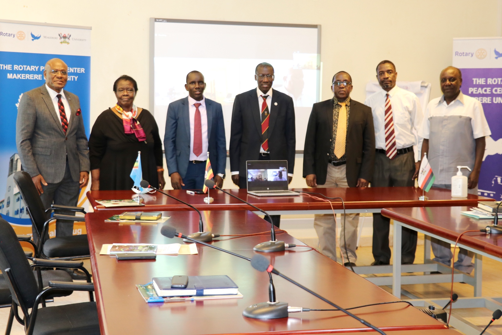 AFRISA Board of Directors Incoming Chairperson, Prof. Frank Norbert Mwiine (middle) together with the outgoing Chairperson, Prof. John David Kabasa (3rd R) pose for a photo with the Institute’s Board Members and Makerere University’s Legal Officers during the handover ceremony on 15th September 2022.