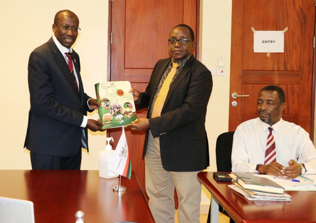 AFRISA Board of Directors Incoming Chairperson, Prof. Frank Norbert Mwiine (L) together with the outgoing Chairperson, Prof. John David Kabasa (R) during the handover ceremony.