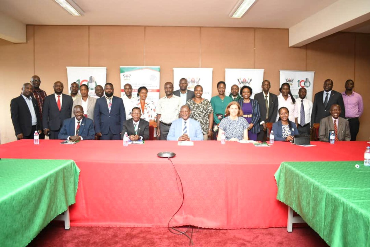 Seated: The Vice Chancellor, Prof. Barnabas Nawangwe (3rd L) Ms. Claudia Frittelli (3rd R), Ag. DVCAA & Director DRGT, Prof. Buyinza Mukadasi (2nd L), Prof. Norbert Frank Mwiine (L), Prof. Sarah Ssali (2nd R), Mr. Alfred Masikye Namoah (R) and members of Top Management at the meeting on 1st September 2022, Council Room, Makerere University.