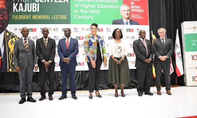 H.E. Natalie Brown (C) flanked by the Chairperson of Council-Mrs. Lorna Magara (3rd R) and Deputy Chairperson-Rt. Hon. Daniel Kidega (3rd L) and L-R: DVCAA-Prof. Umar Kakumba, Prof. Anthony Muwagga Mugagga, Mr. Wasswa Kajubi and Dr. Michael Pippenger at the Memorial Lecture on 22nd Sept 2022, Yusuf Lule Central Teaching Facility Auditorium, Makerere University.
