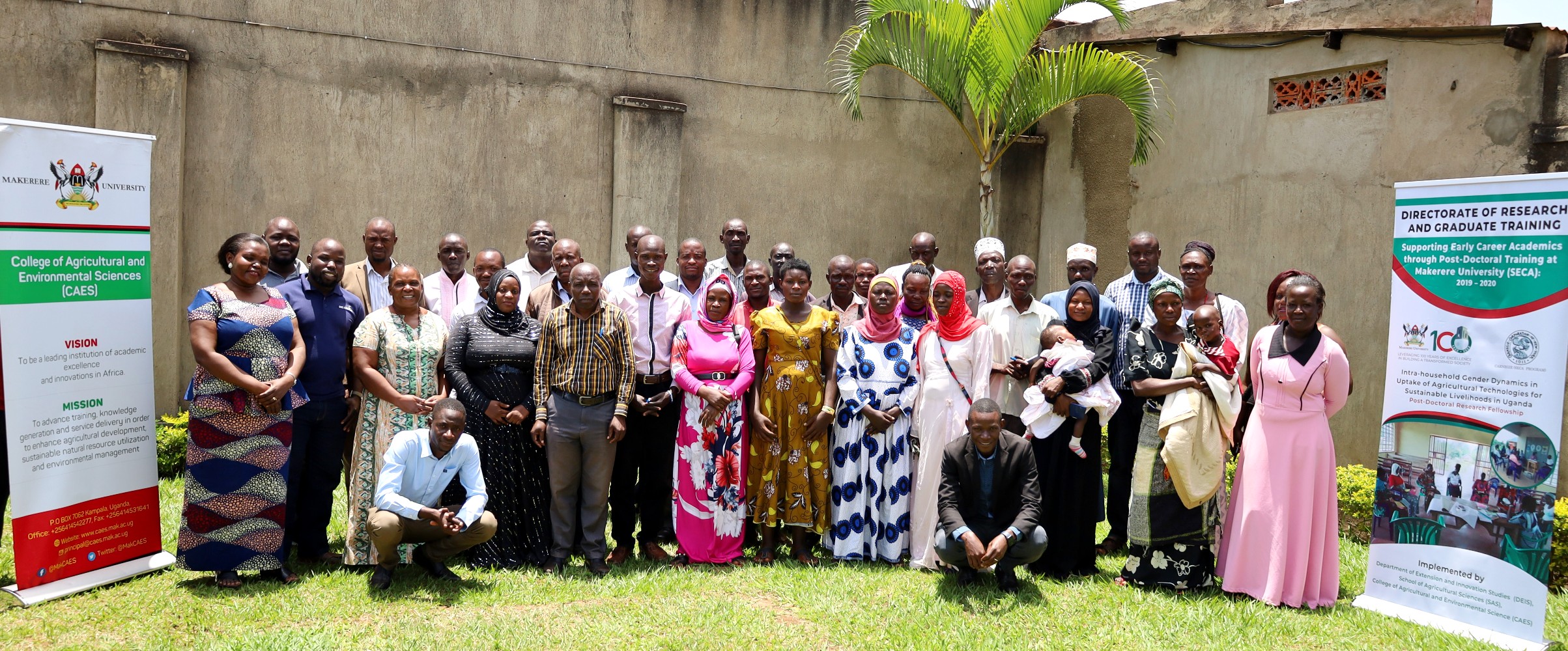 Farmers from Nambaale Subcounty in Iganga take a group photo with researchers after the meeting at Vick Hotel.