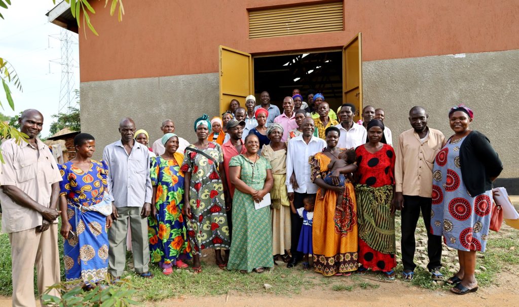 Farmers from Buwunga Sub-County and researchers take a group photo after the meeting.