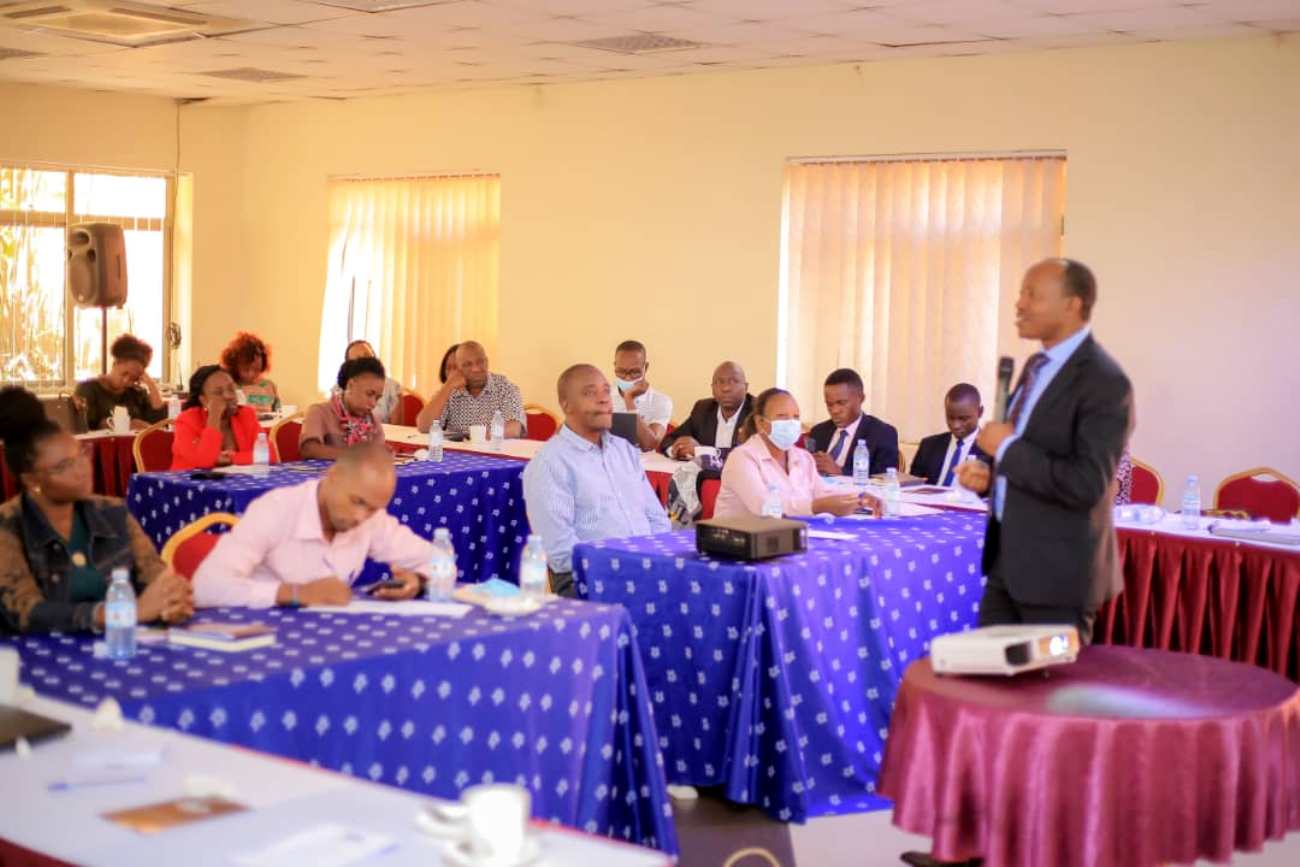 Dr. Godfrey Siu, the Principal Investigator from Mak-CHDC presenting the contents of the National Parenting Standards Draft Manual on 22nd July 2022. Child Health and Development Centre (CHDC), School of Medicine, College of Health Sciences, Makerere University, Kampala Uganda, East Africa.