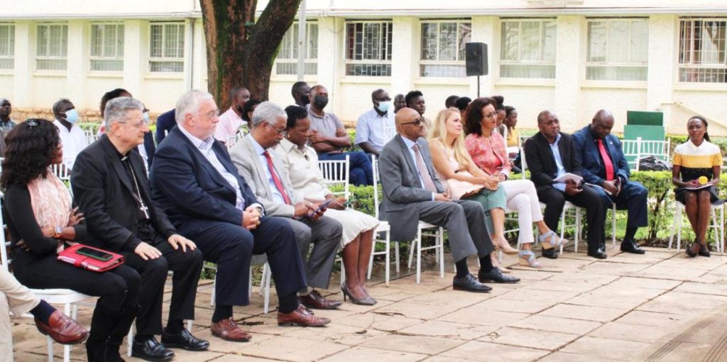 Participants listen to proceedings during the  “In Sickness and In Health”, exhibition opening ceremony.